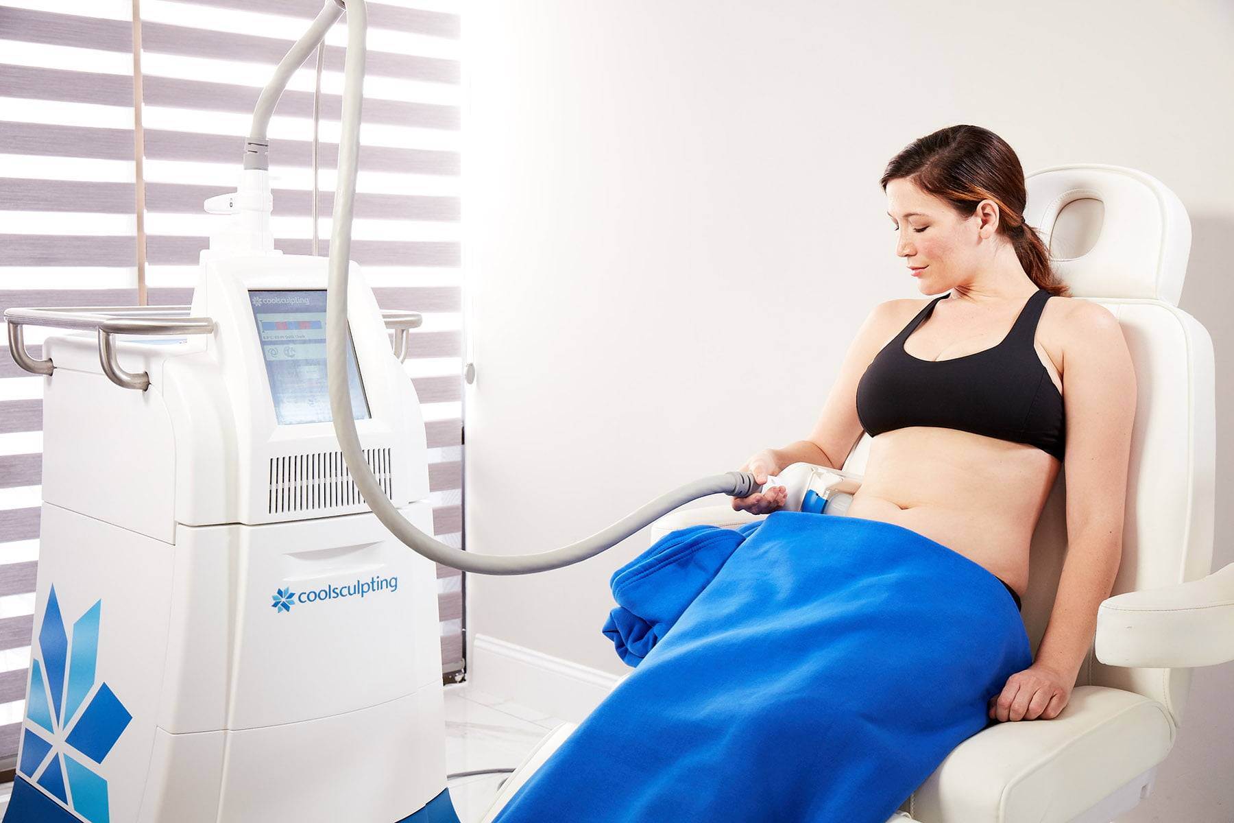 CoolSculpting_Treatment woman getting laser treatment for acne scars